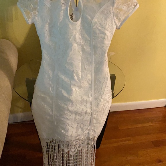 laced in fringe bandage mini dress. - Picture 2 of 4